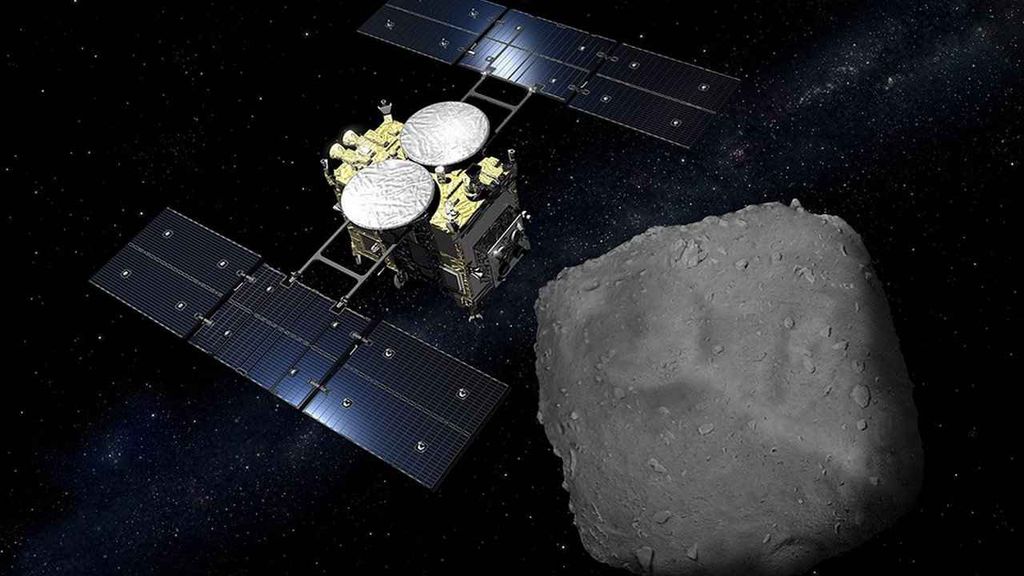 Sonda Hayabusa2 e asteroide Ryugu (Imagem: Reprodução/JAXA)